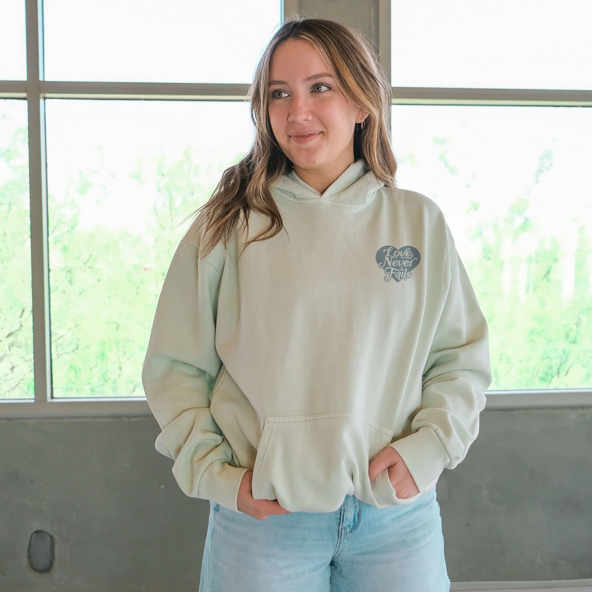 Love Never Fails Pullover Hoodie - Image 2